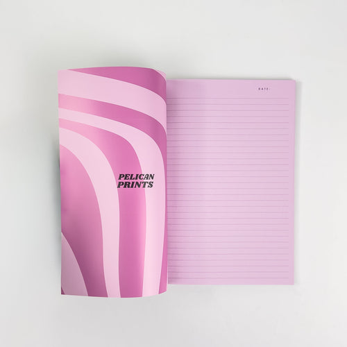 Softcover Notizbuch A5 aufgeschlagen mit linierten Seiten – Pelican Prints