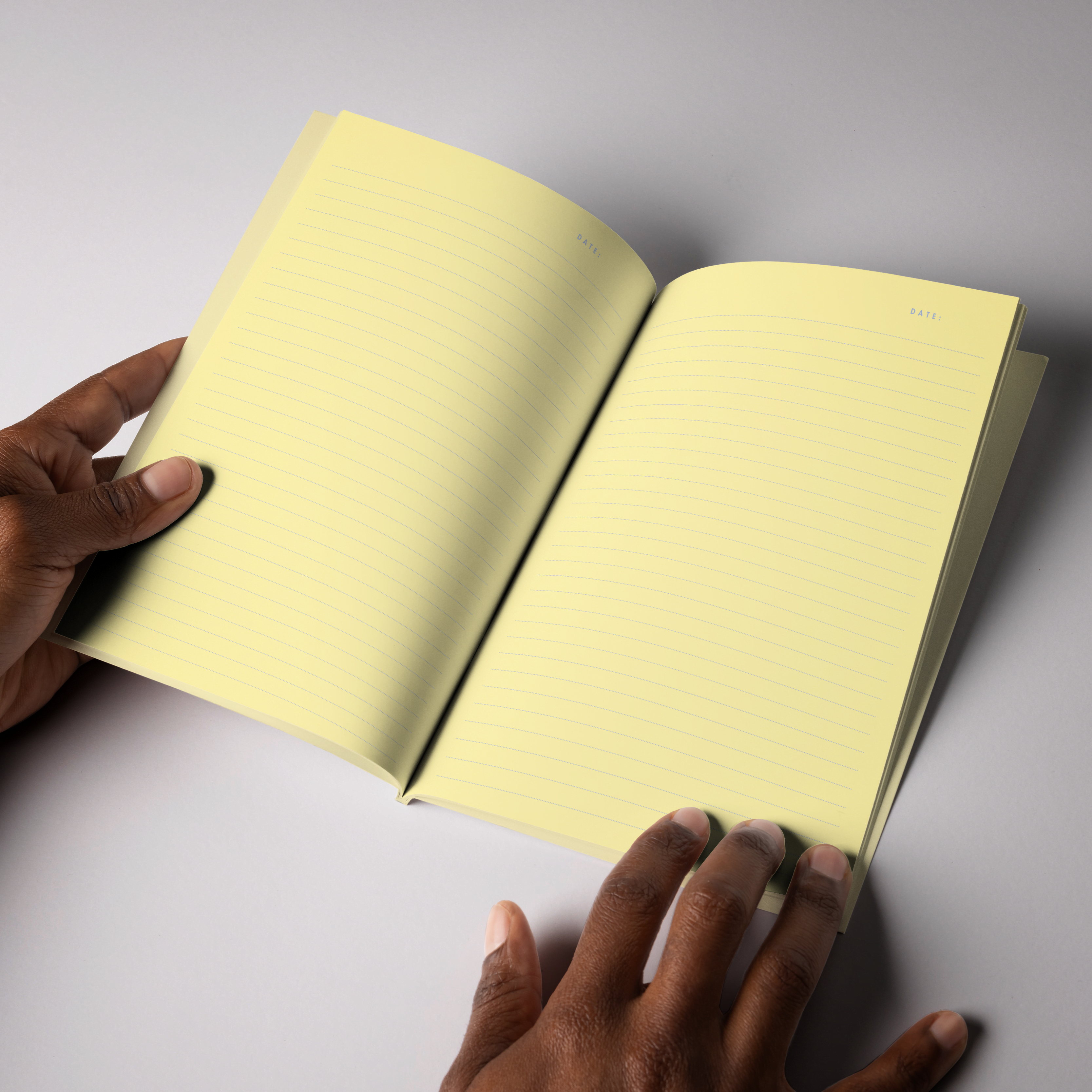 Softcover Notizbuch A5 aufgeschlagen mit linierten Seiten – Pelican Prints