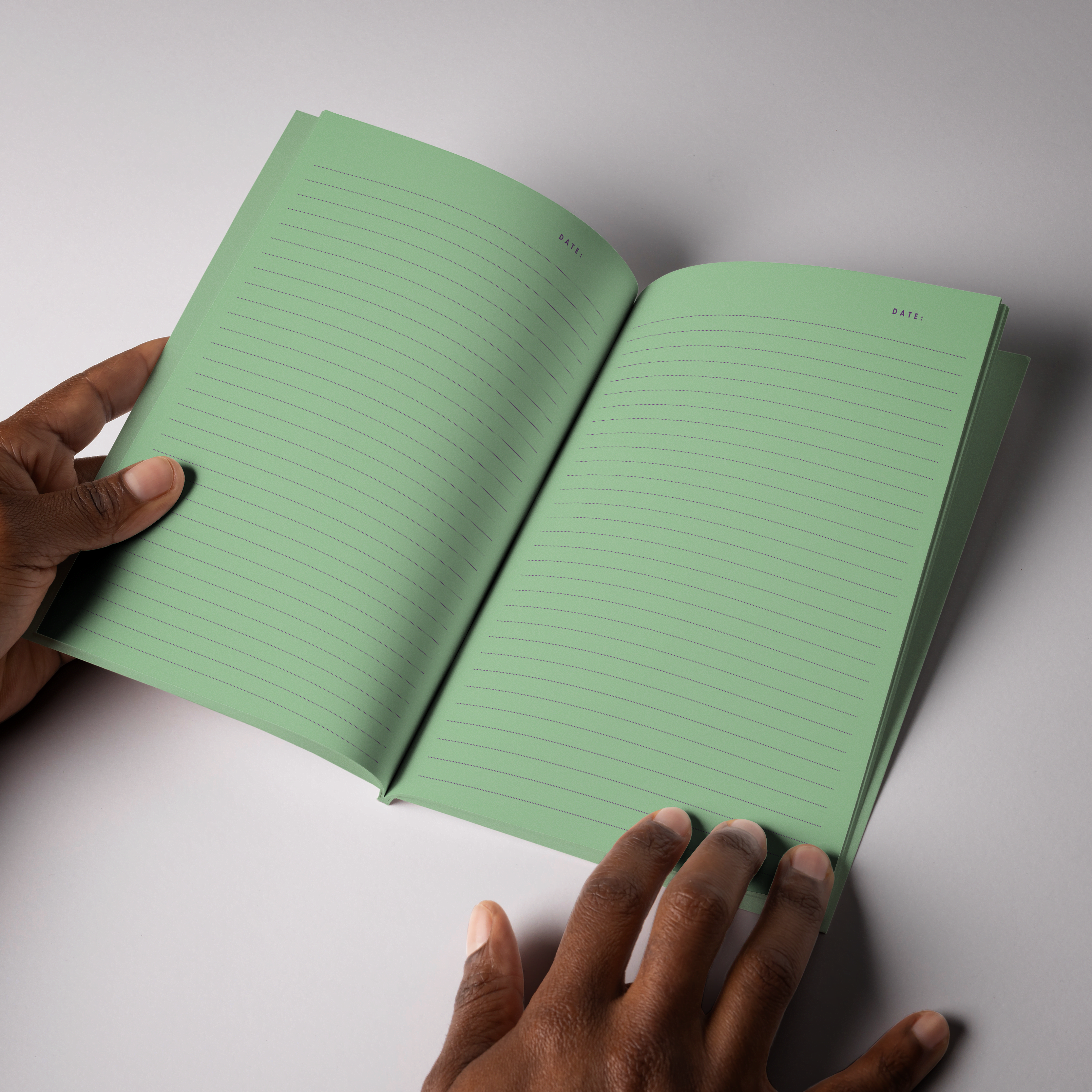 Softcover Notizbuch A5 aufgeschlagen mit linierten Seiten – Pelican Prints