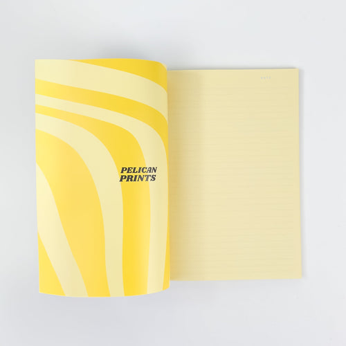 Softcover Notizbuch A5 aufgeschlagen mit linierten Seiten – Pelican Prints