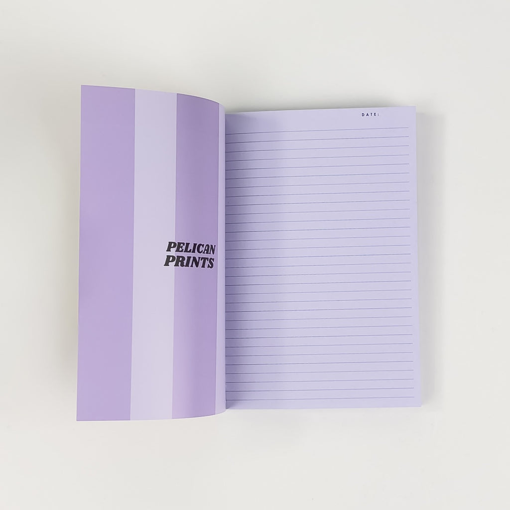 Softcover Notizbuch A6 aufgeschlagen mit linierten Seiten – Pelican Prints