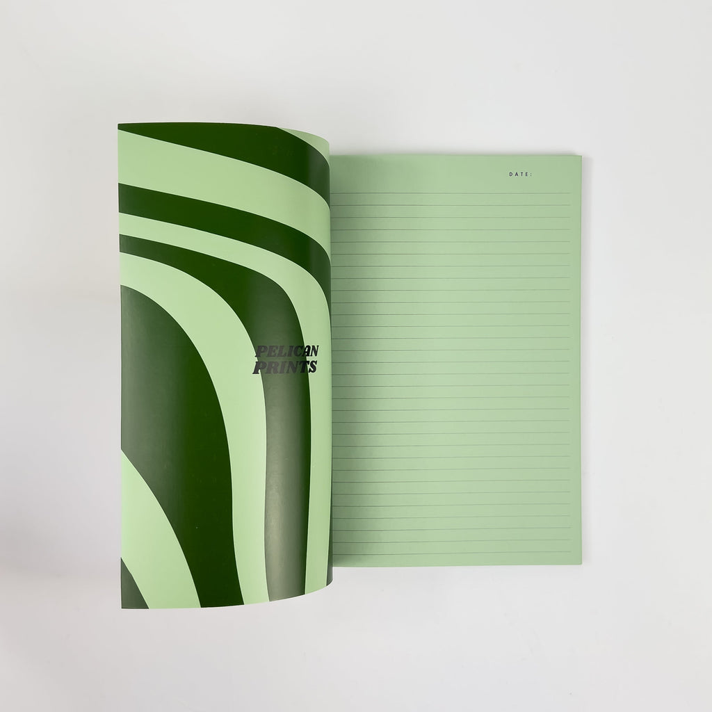 Softcover Notizbuch A5 aufgeschlagen mit linierten Seiten – Pelican Prints