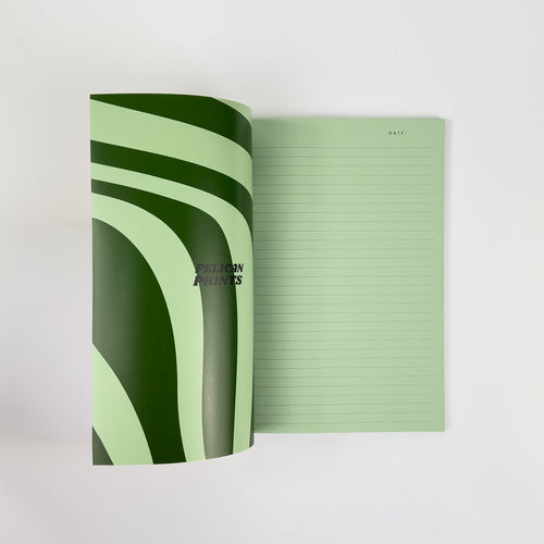 Softcover Notizbuch A5 aufgeschlagen mit linierten Seiten – Pelican Prints